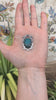 Silver cast prickly pear framing turquoise cabochon